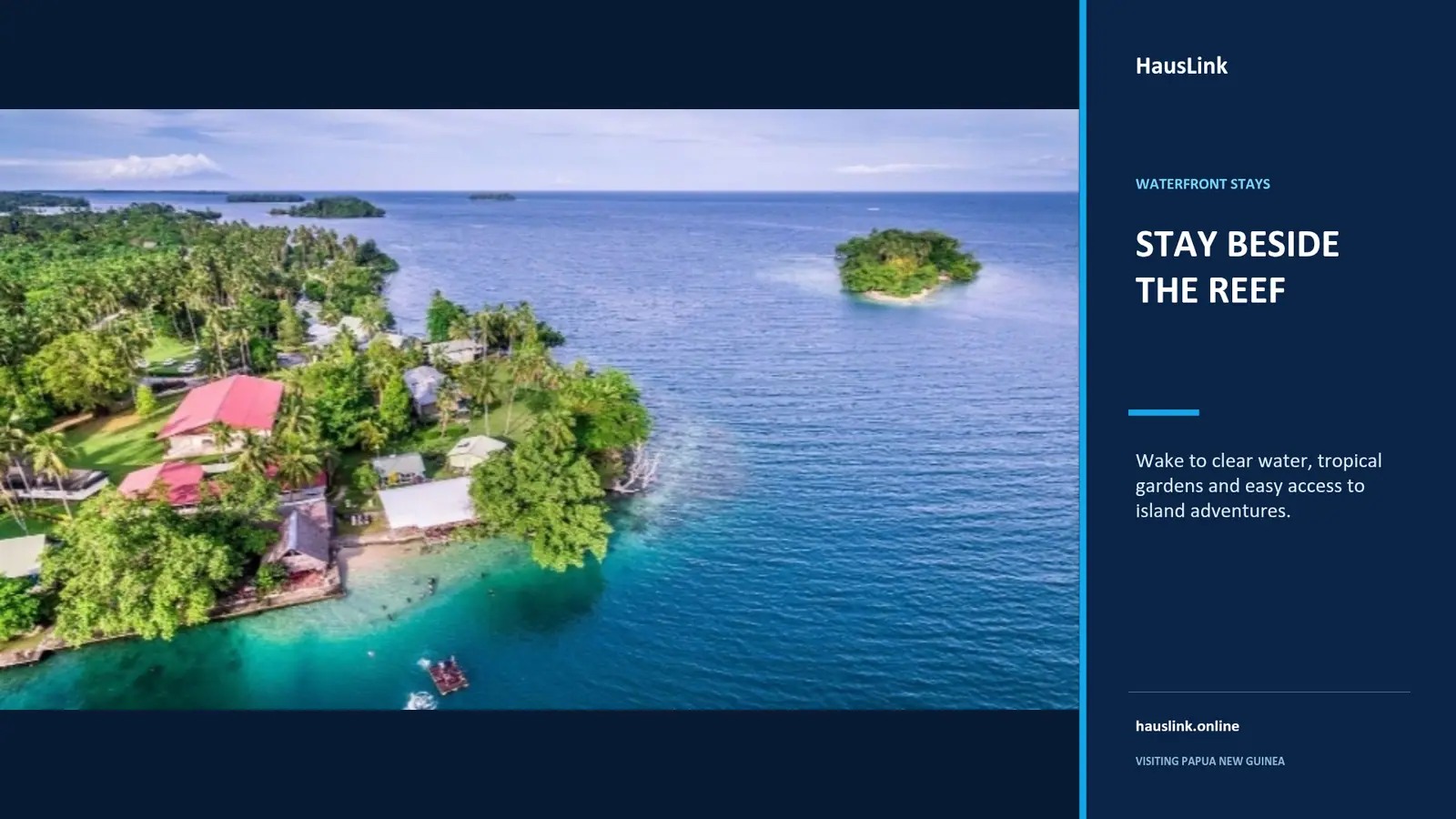 Waterfront village and guest houses beside a coral reef and small tropical island in Papua New Guinea.